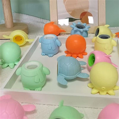 Juguete de taza emergente de animal marino blando