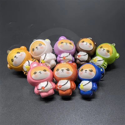 Llavero Squishy de osito de crecimiento lento con ropa